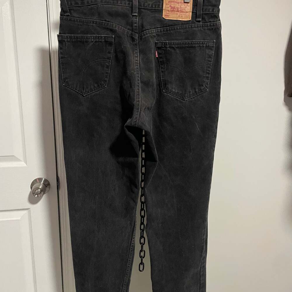 Vintage Levi's 550 Relaxed Fit Black faded tapered jeans baggy 36x32